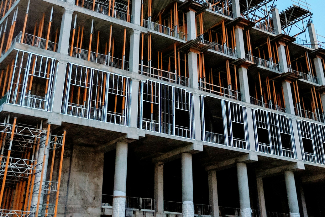 Gray concrete building under construction